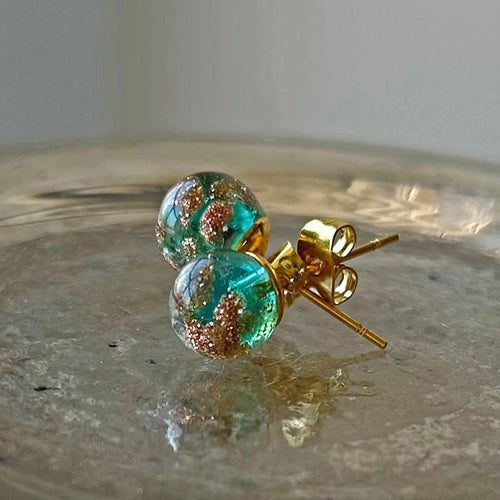 Earrings with teal (green) translucent and aventurine Murano glass sphere studs on gold posts