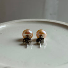 Pearl earrings with small pink cultured freshwater near round studs on surgical steel posts