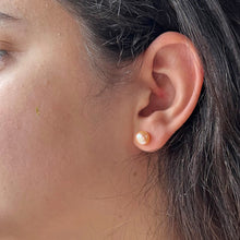 Pearl earrings with small pink cultured freshwater near round studs on surgical steel posts