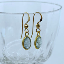 Gemstone earrings with aquamarine (blue) crystal drops on gold hooks