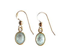 Gemstone earrings with aquamarine (blue) crystal drops on gold hooks