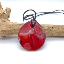 Necklace with red pastel Murano glass near circular large flat pendant