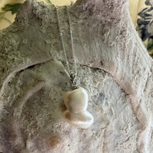 Necklace with large white double conjoined twist pearl & diamante pendant on silver satellite chain