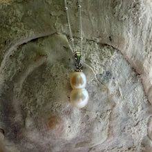 Necklace with small white baroque double conjoined pearl pendant on silver satellite chain