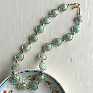 Necklace with turquoise (blue) pastel graffiti and gold Murano glass medium lentil beads on gold