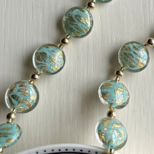 Necklace with turquoise (blue) pastel graffiti and gold Murano glass medium lentil beads on gold