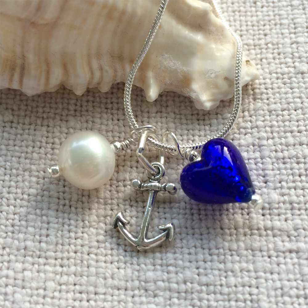 Three charm necklace in Sterling Silver with dark blue (cobalt) Murano glass heart, anchor and pearl