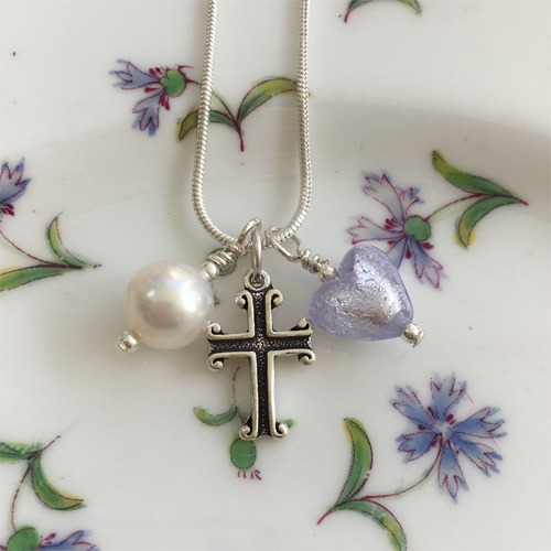 Three charm necklace in Sterling Silver with lilac Murano glass heart, cross and pearl