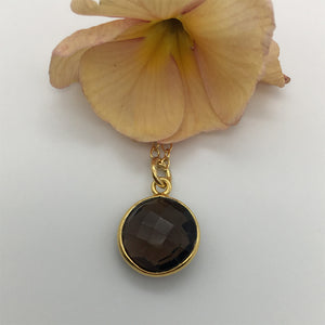 Gemstone necklace with smoky quartz (brown) crystal pendant on gold cable chain
