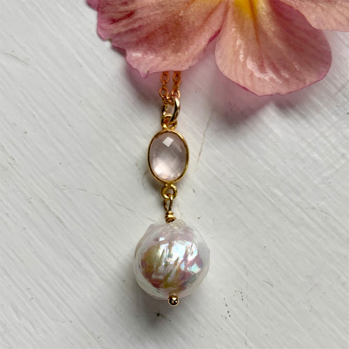 Gemstone necklace with rose quartz (pink) crystal and large pearl pendant on gold chain