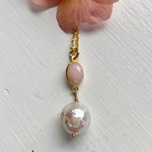 Gemstone necklace with pink opal crystal and large pearl pendant on gold cable chain