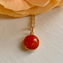 Gemstone necklace with carnelian (red) crystal pendant on gold cable chain