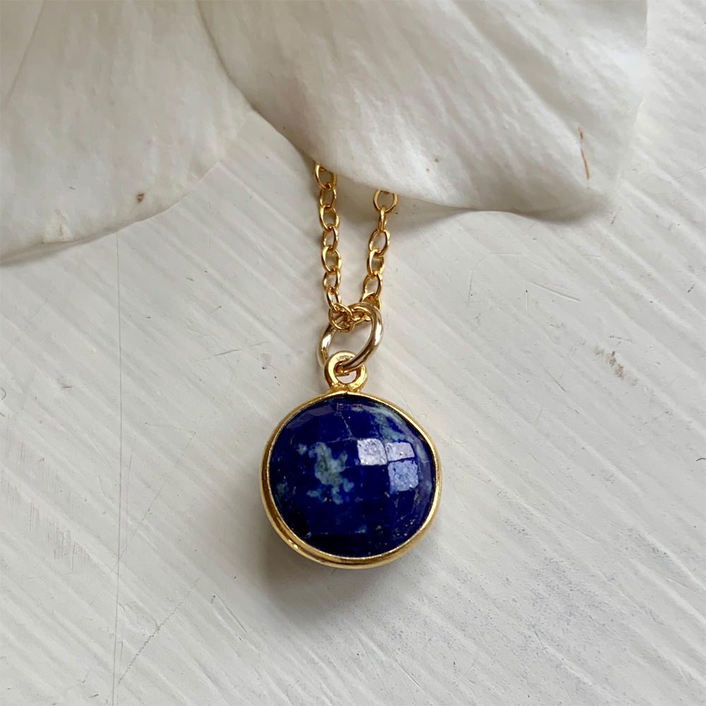Gemstone necklace with lapis lazuli (blue) crystal pendant on gold cable chain