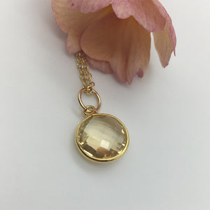 Gemstone necklace with citrine (yellow) crystal pendant on gold cable chain