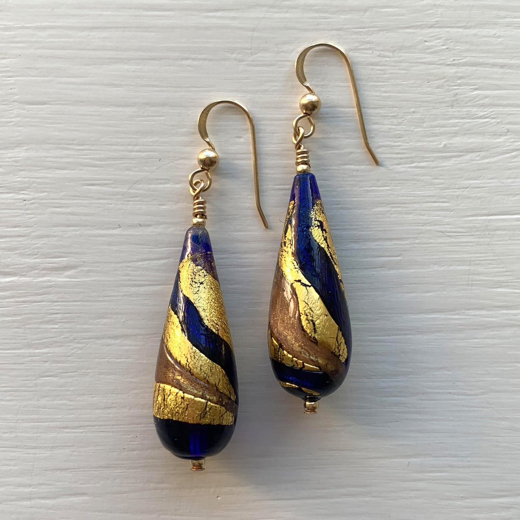 Earrings with dark blue (cobalt) and aventurine swirl over gold Murano glass long pear drops