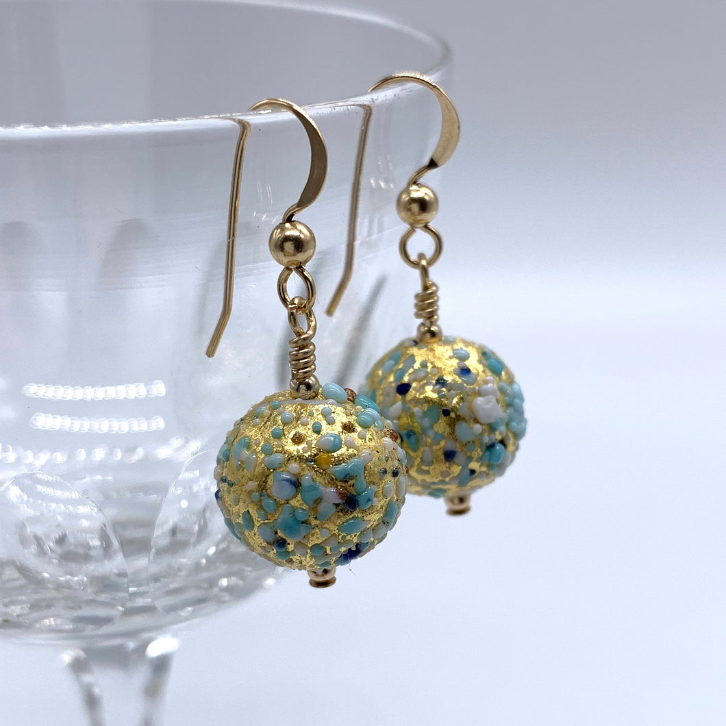 Earrings with speckled blues and white over gold Murano glass small sphere drops