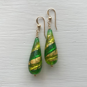 Earrings with light and dark green swirl over gold Murano glass long pear drops