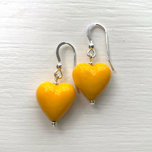 Earrings with dark yellow pastel Murano glass small heart drops on silver or gold hooks