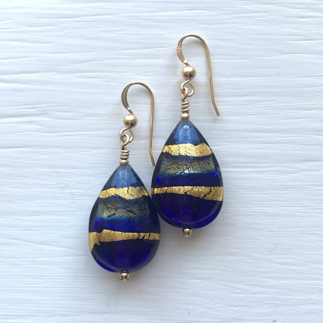 Earrings with shades of dark blue (cobalt) and gold Murano glass medium pear drops on silver or gold