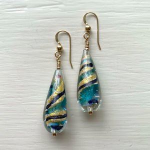 Earrings with turquoise and blue aventurine swirl over gold Murano glass long pear drops