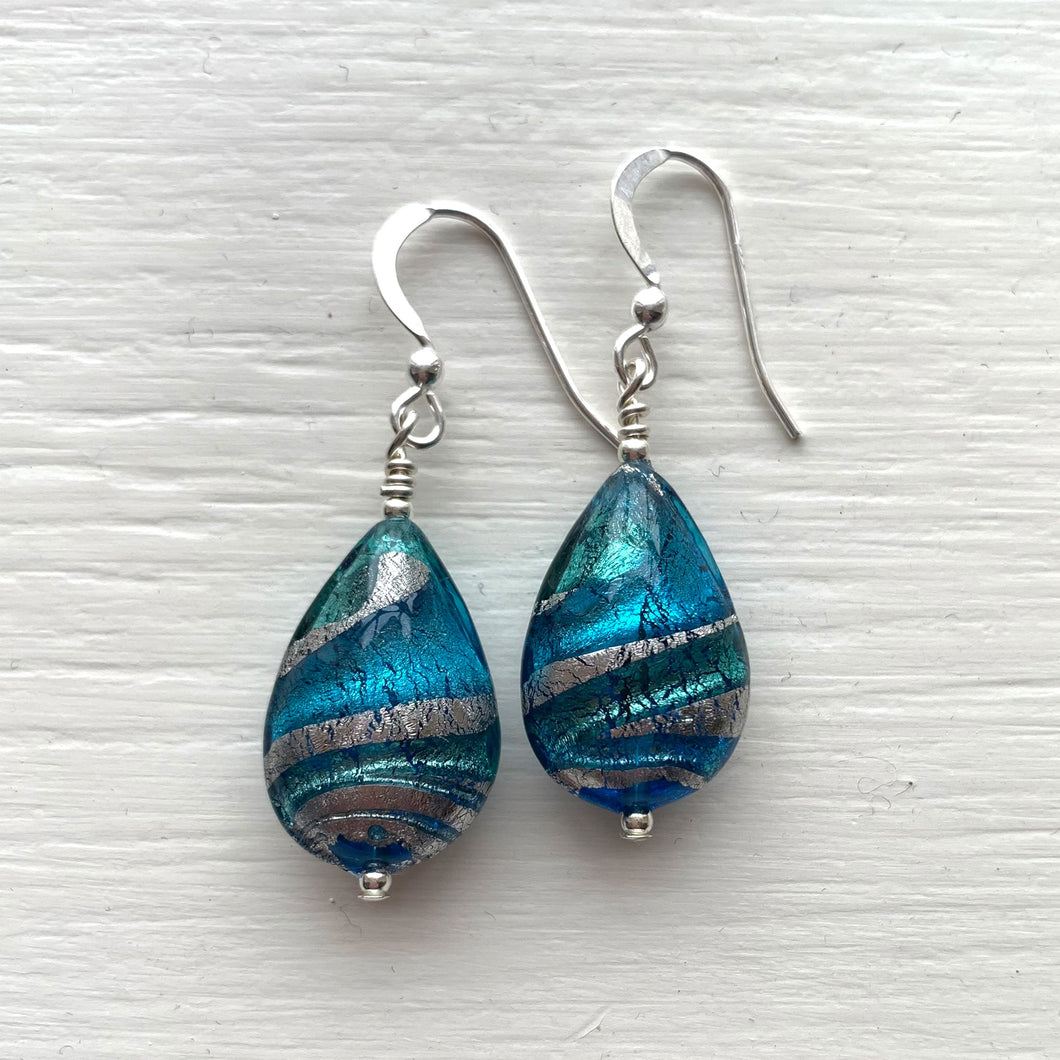 Earrings with turquoise (blue) and teal swirl over gold Murano glass medium pear drops