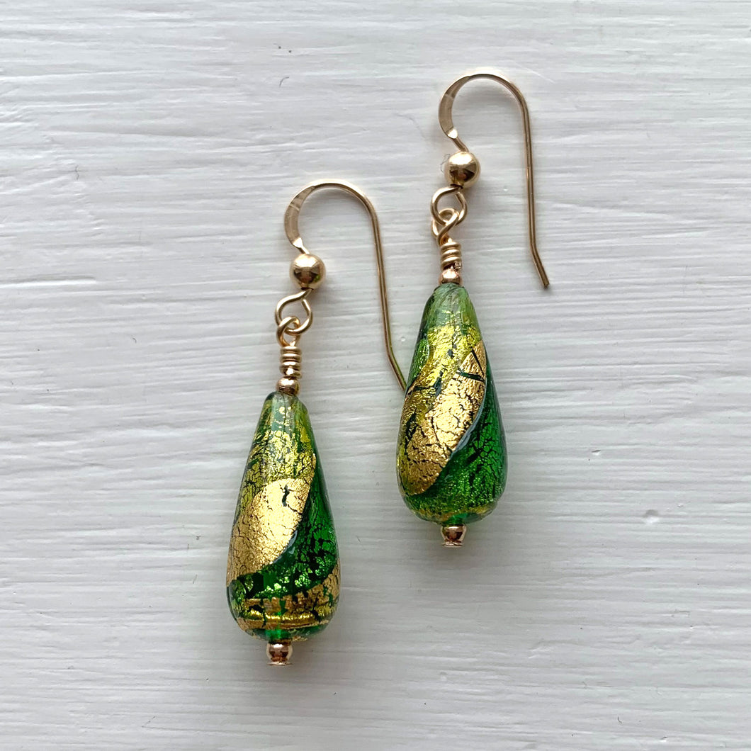 Earrings with light and dark green swirl over gold Murano glass short pear drops