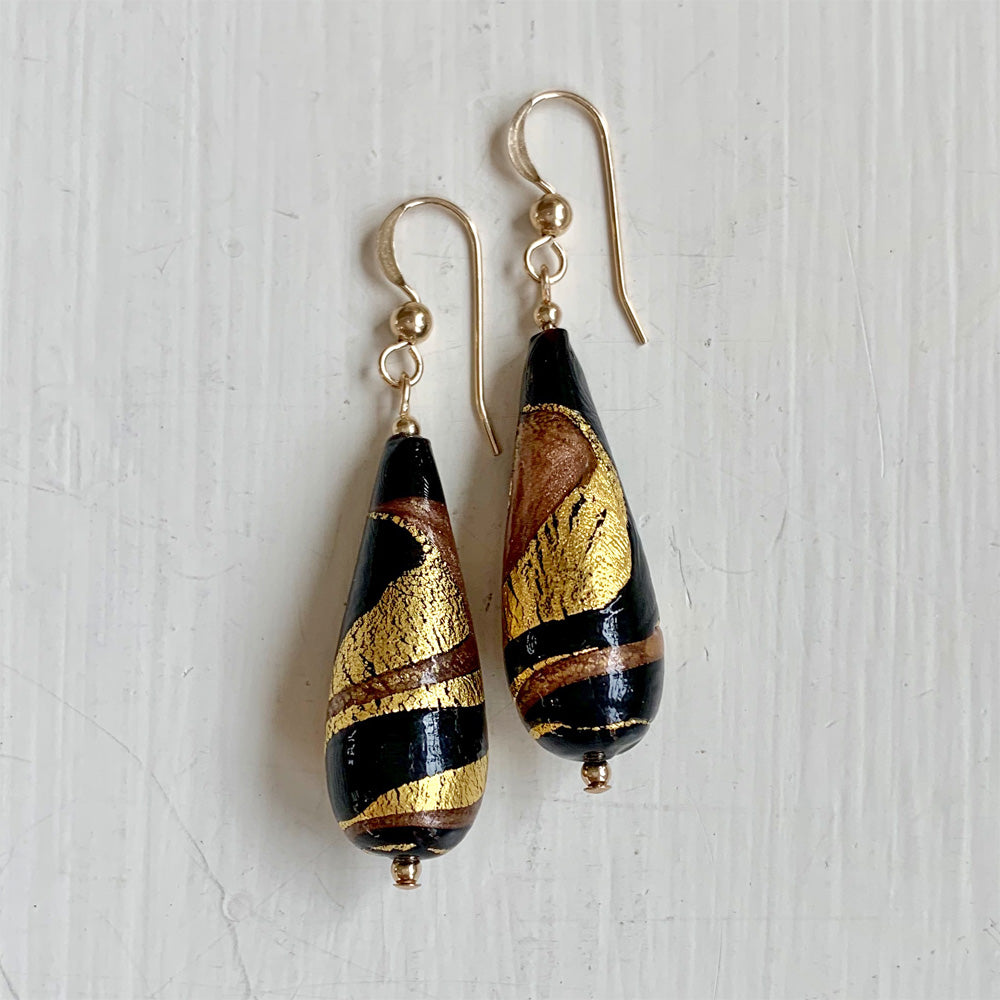 Earrings with black and aventurine swirl over gold Murano glass long pear drops