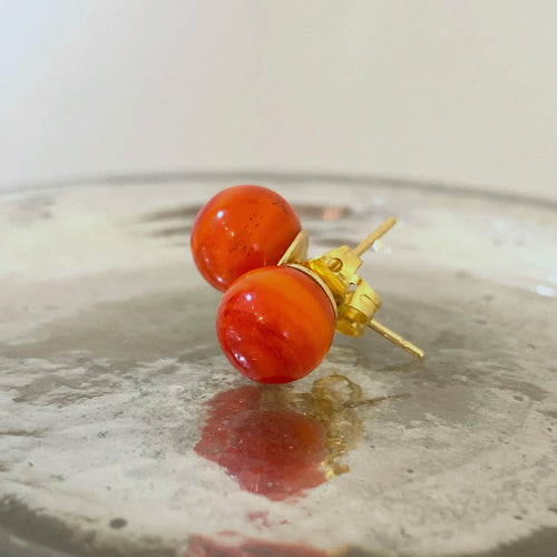 Earrings with light red pastel Murano glass sphere studs on 24ct gold plated posts