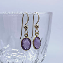 Gemstone earrings with amethyst (purple) crystal drops on silver or gold hooks