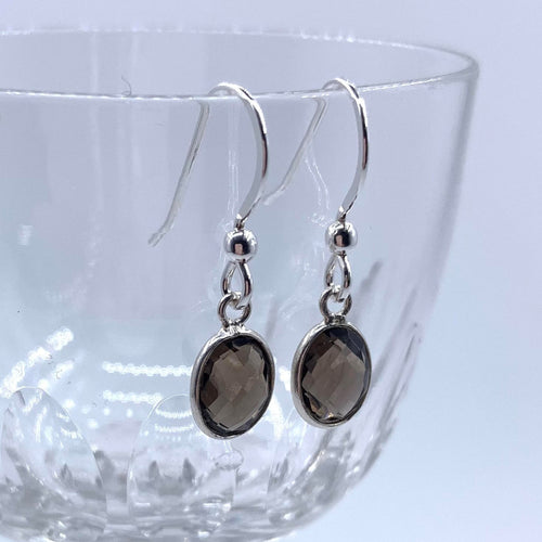Gemstone earrings with smoky quartz (brown) crystal drops on silver hooks