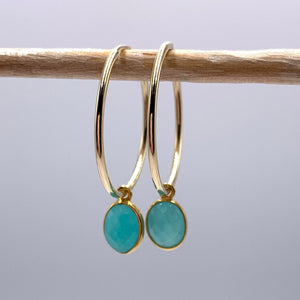Gemstone earrings with amazonite (blue) oval crystal drops on gold large hoops