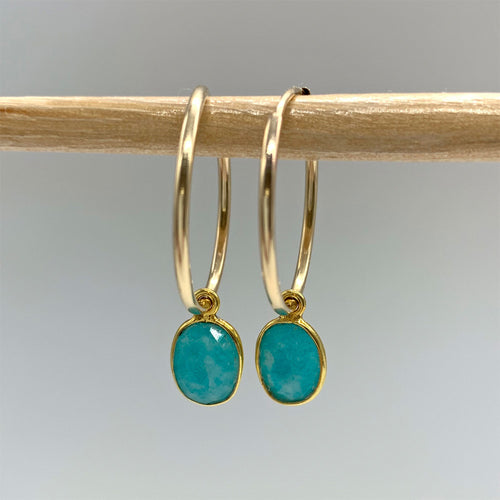 Gemstone earrings with amazonite (blue) oval crystal drops on gold medium hoops