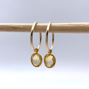 Gemstone earrings with citrine (yellow) oval crystal drops on gold small hoops