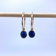 Gemstone earrings with lapis lazuli (blue) oval crystal drops on gold small hoops