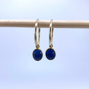Gemstone earrings with lapis lazuli (blue) oval crystal drops on gold small hoops