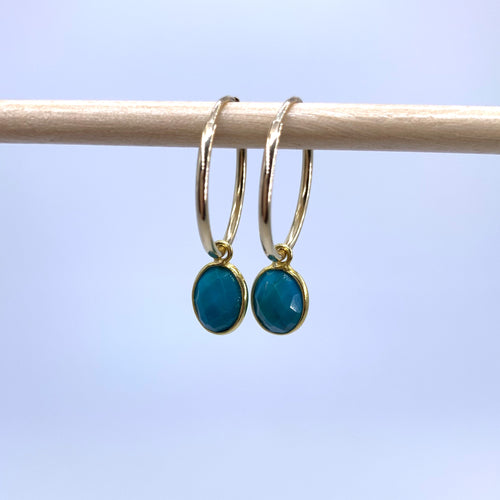 Gemstone earrings with turquoise (blue) oval crystal drops on gold small hoops