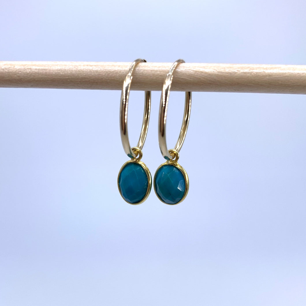 Gemstone earrings with turquoise (blue) oval crystal drops on gold small hoops