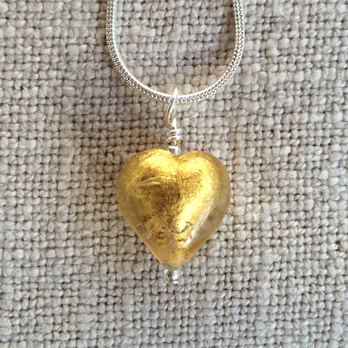 Necklace with light (pale) gold Murano glass small heart pendant on silver snake chain