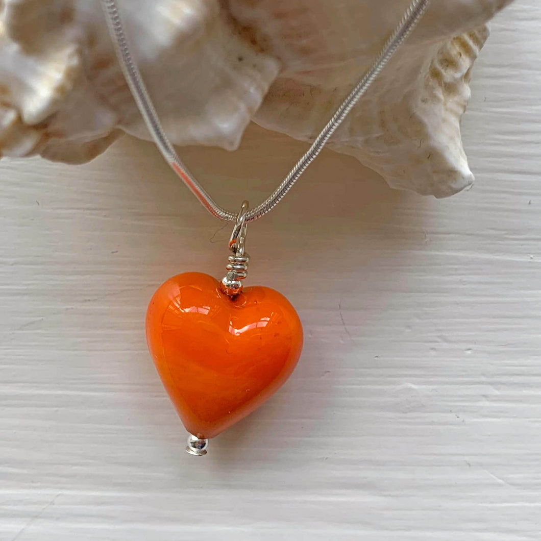 Necklace with orange pastel Murano glass small heart pendant on silver snake chain