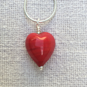 Necklace with red pastel Murano glass small heart pendant on silver snake chain