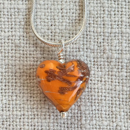Necklace with orange and aventurine Murano glass small heart pendant on silver chain