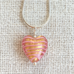 Necklace with pink spiral and gold Murano glass small heart pendant on silver snake chain