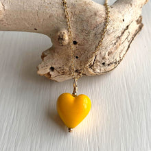 Necklace with dark yellow pastel Murano glass small heart pendant on gold cable chain