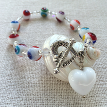Bracelet with white Murano glass mosaic beads, Swarovski© crystals and heart charm