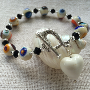 Bracelet with ivory (white) Murano glass mosaic beads, Swarovski© crystals and heart charm