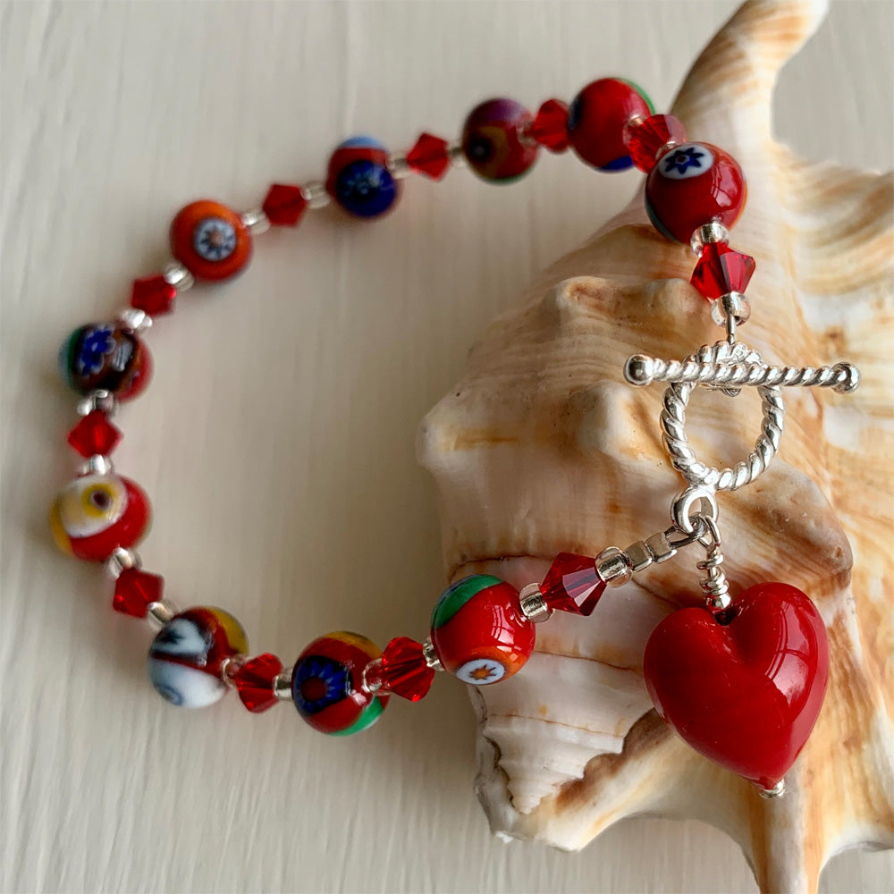 Bracelet with red Murano glass mosaic beads, Swarovski© crystals and heart charm
