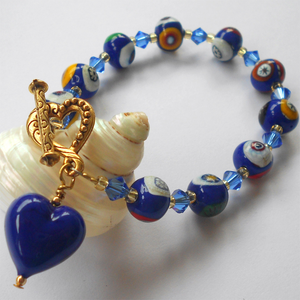Bracelet with dark blue Murano glass mosaic beads, Swarovski© crystals and heart charm