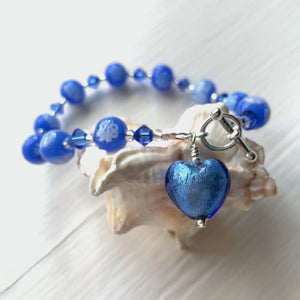 Bracelet with blue Murano glass marguerite beads, Swarovski© crystals and heart charm