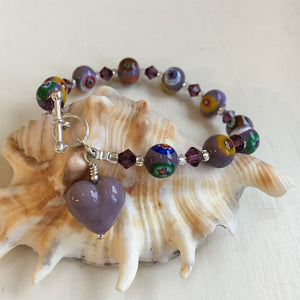 Bracelet with purple Murano glass mosaic beads, Swarovski© crystals and heart charm
