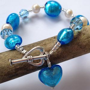 Bracelet with turquoise (blue) Murano glass beads, Swarovski© crystals, pearls, charm